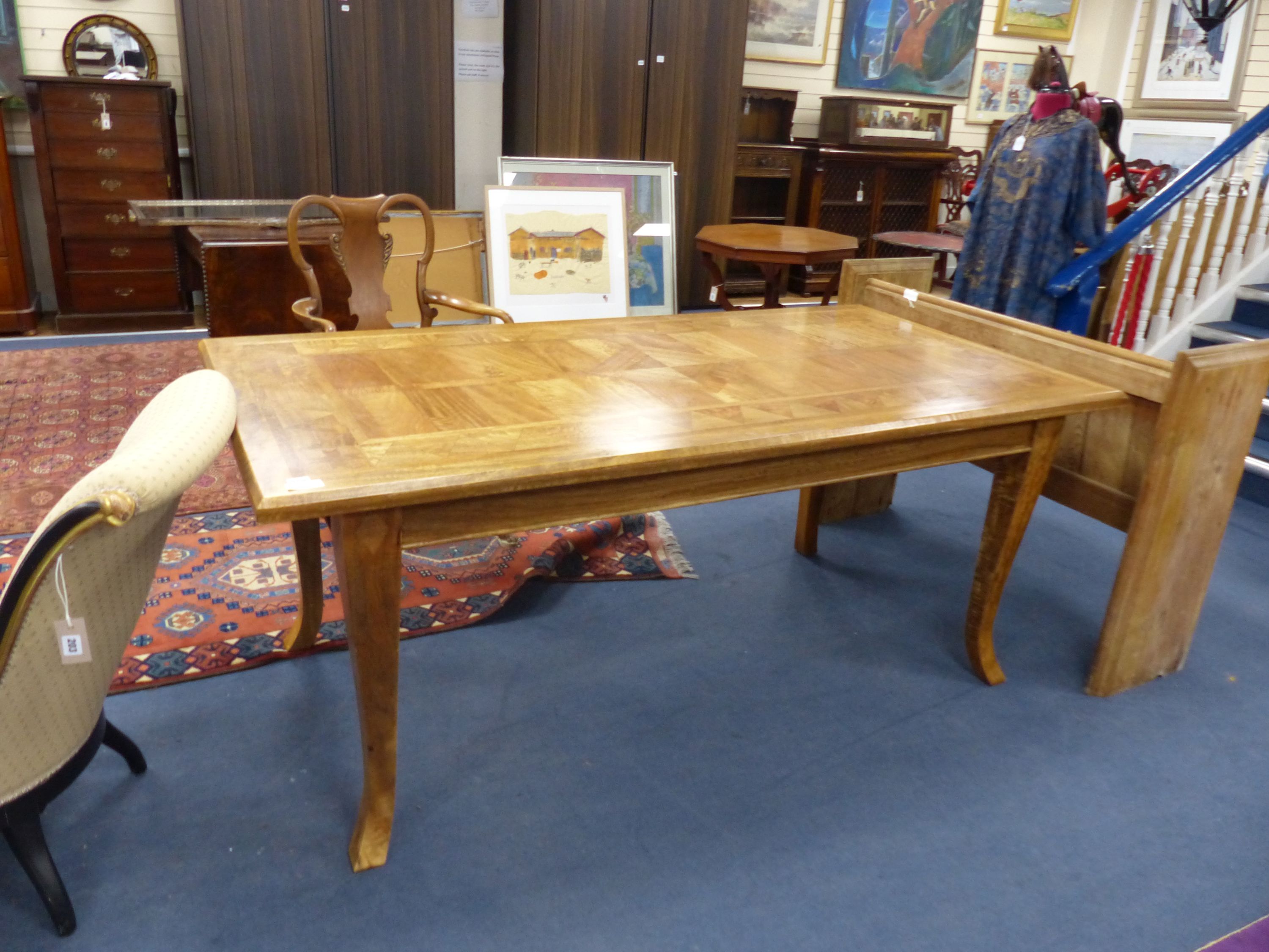 A rectangular Continental parquetry dining table, length 180cm, depth 90cm, height 75cm